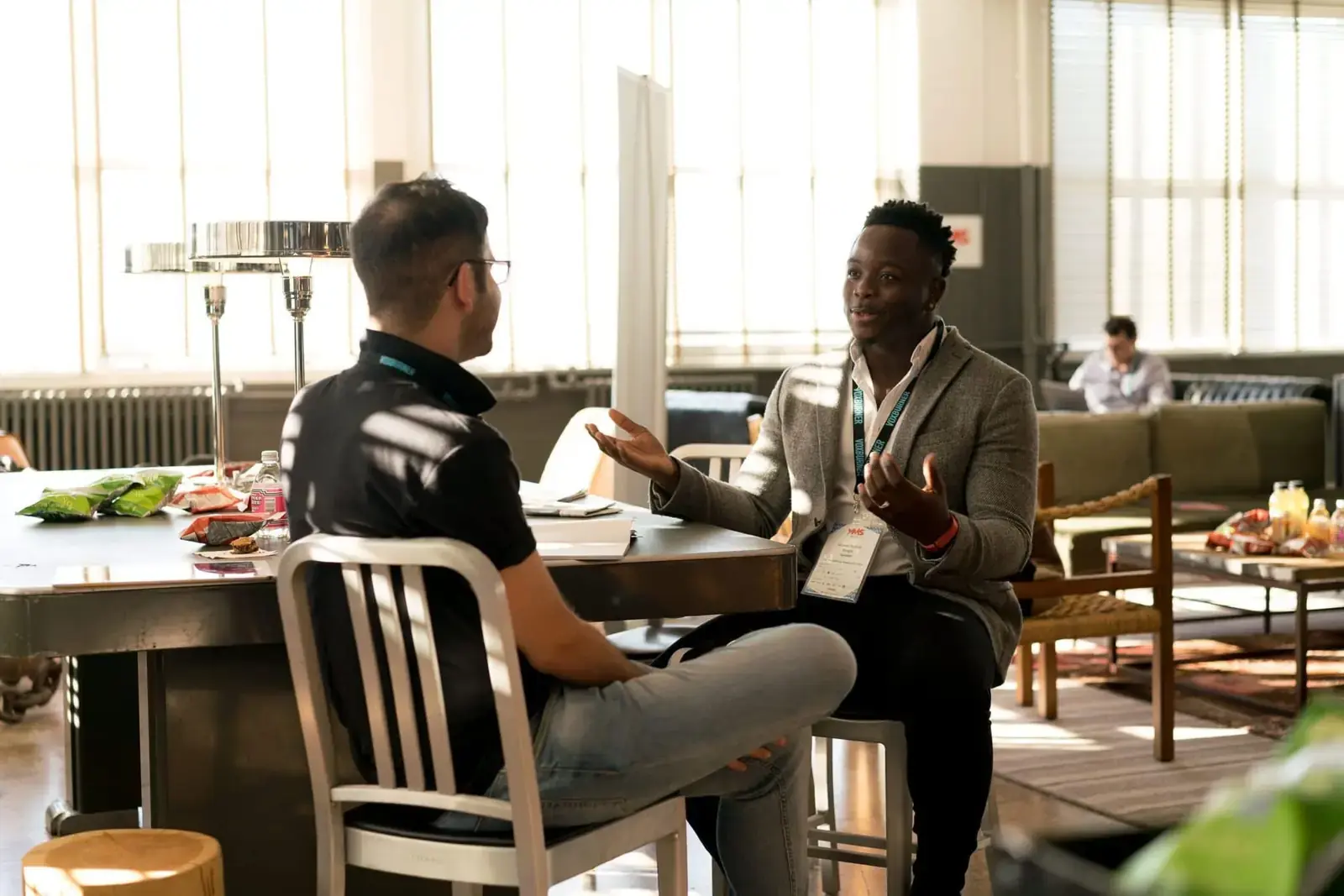 Two people in a relaxed mentoring conversation